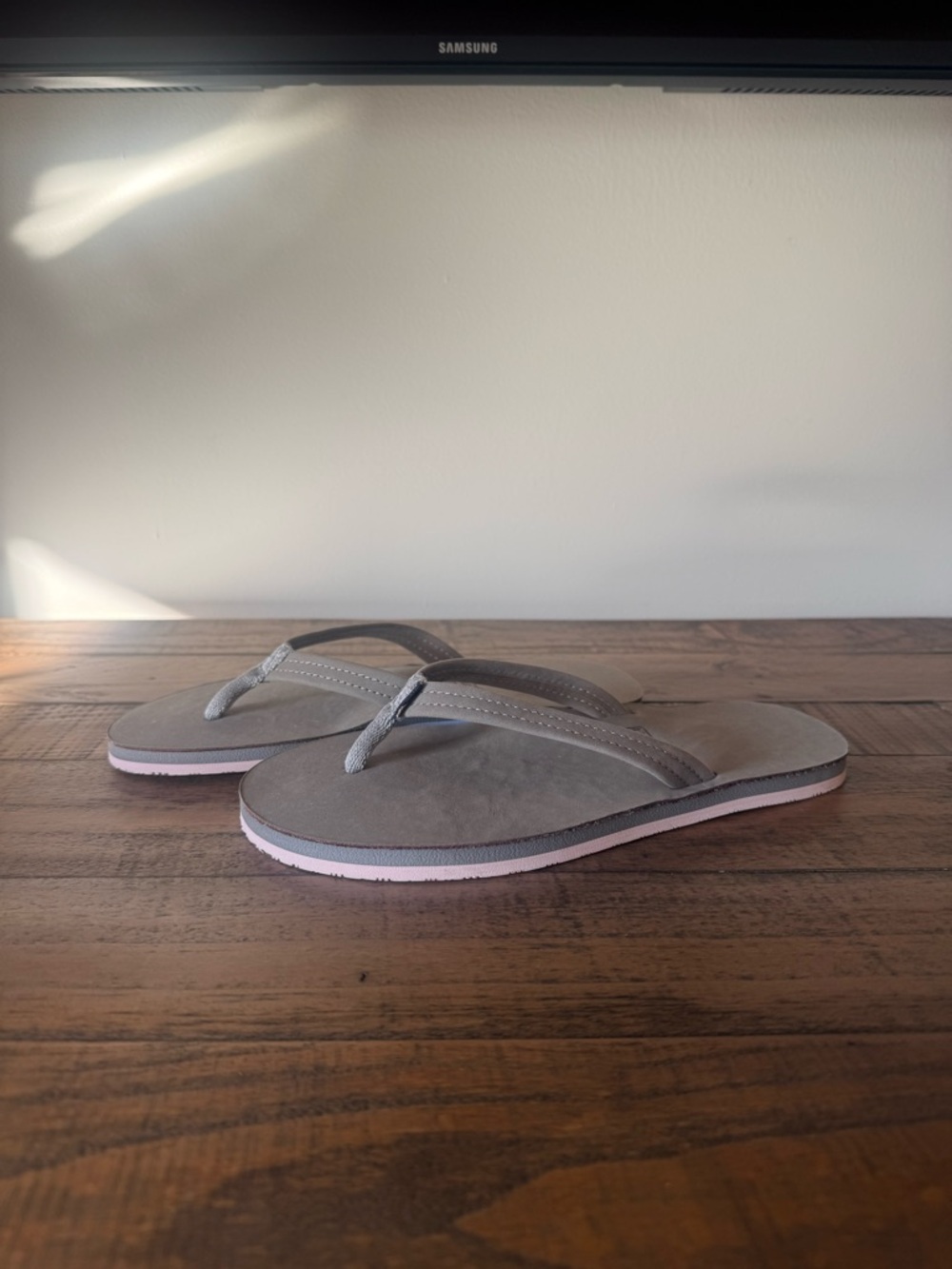 Women’s Gray Flip Flop Sandals with Pink Accent